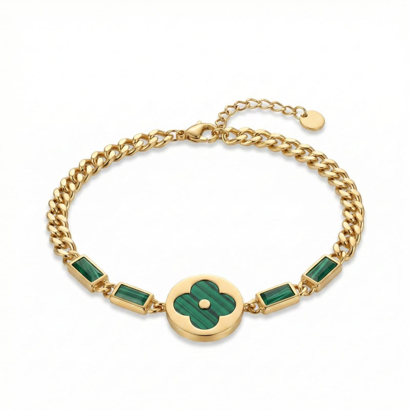 An elegant gold bracelet made of rust-resistant stainless steel, featuring a large, distinctive green flower at its center, adorned with green stones. It has an adjustable clasp for a perfect fit. - Image 1